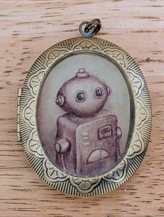 A Cagey Bee Jewelry - EUC A Cagey Bee Handmade Antique Robot Locket